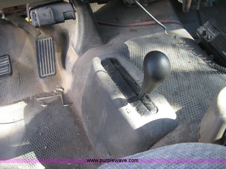 image for item J7879 2004 Chevrolet Silverado 2500HD flatbed pickup truck