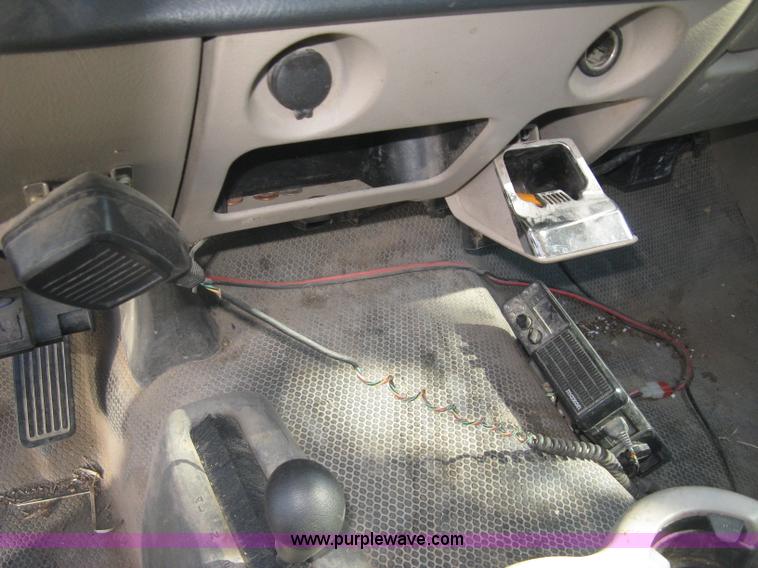 image for item J7879 2004 Chevrolet Silverado 2500HD flatbed pickup truck