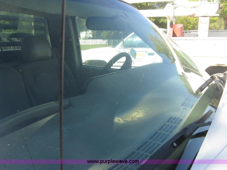 image for item J7879 2004 Chevrolet Silverado 2500HD flatbed pickup truck