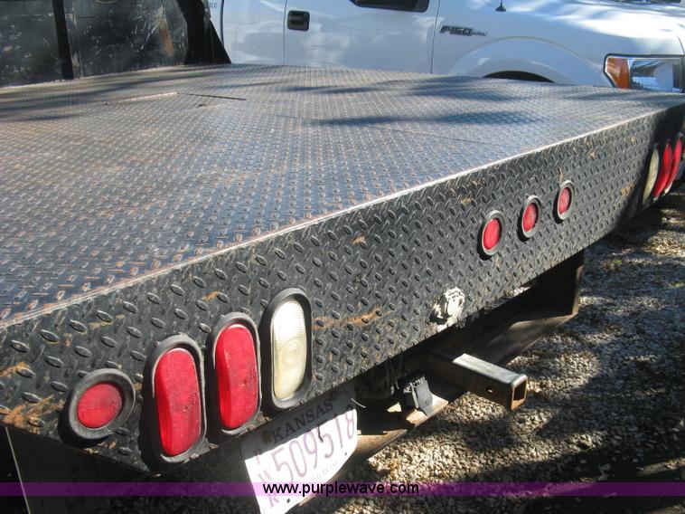 image for item J7879 2004 Chevrolet Silverado 2500HD flatbed pickup truck