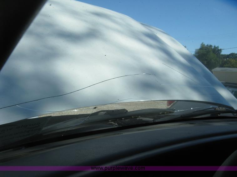 image for item J7879 2004 Chevrolet Silverado 2500HD flatbed pickup truck