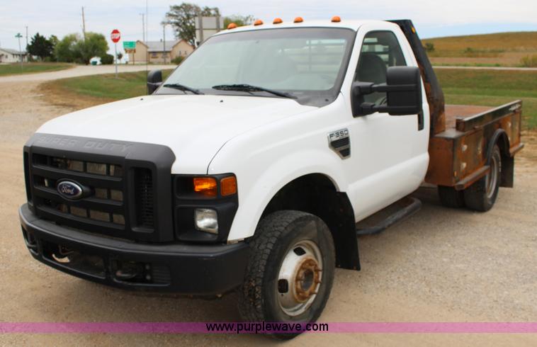 image for item K1195 2008 Ford F350 Super Duty XL flatbed pickup truck