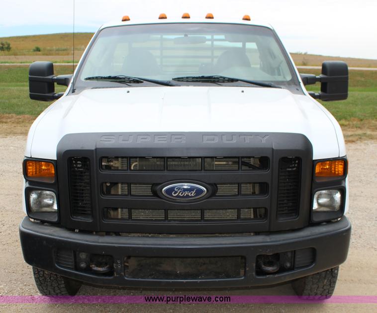 image for item K1195 2008 Ford F350 Super Duty XL flatbed pickup truck