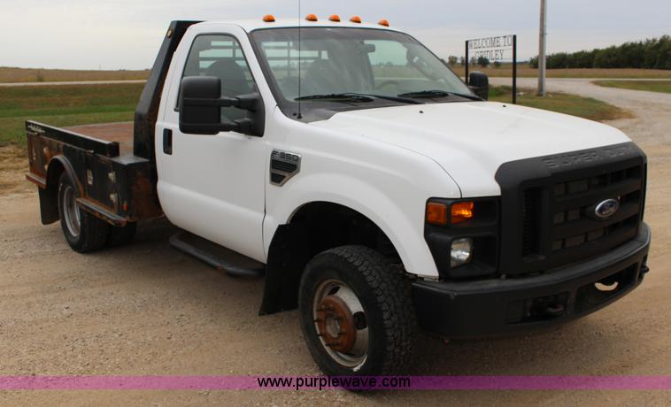 image for item K1195 2008 Ford F350 Super Duty XL flatbed pickup truck