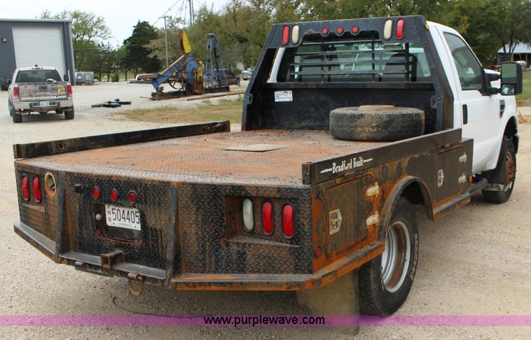 image for item K1195 2008 Ford F350 Super Duty XL flatbed pickup truck