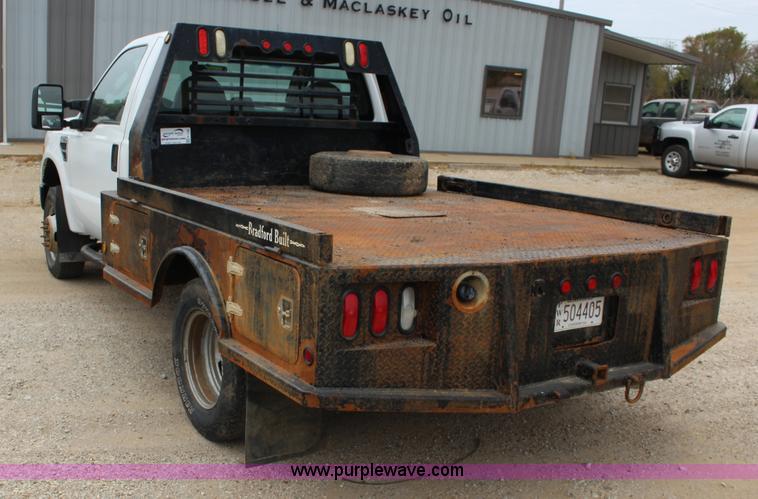 image for item K1195 2008 Ford F350 Super Duty XL flatbed pickup truck