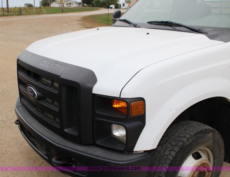 image for item K1195 2008 Ford F350 Super Duty XL flatbed pickup truck