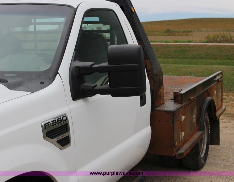 image for item K1195 2008 Ford F350 Super Duty XL flatbed pickup truck
