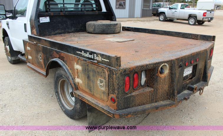 image for item K1195 2008 Ford F350 Super Duty XL flatbed pickup truck