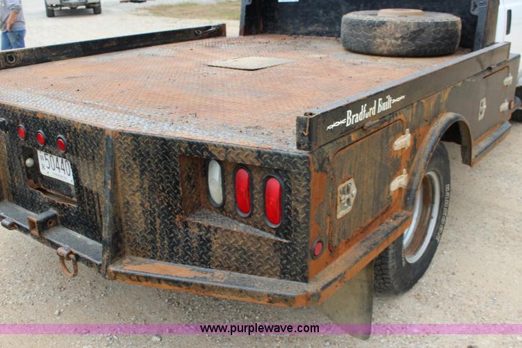 image for item K1195 2008 Ford F350 Super Duty XL flatbed pickup truck