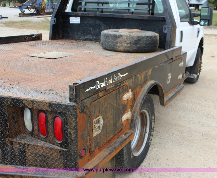 image for item K1195 2008 Ford F350 Super Duty XL flatbed pickup truck