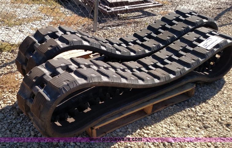 image for item K1223 John Deere 323E skid steer tracks