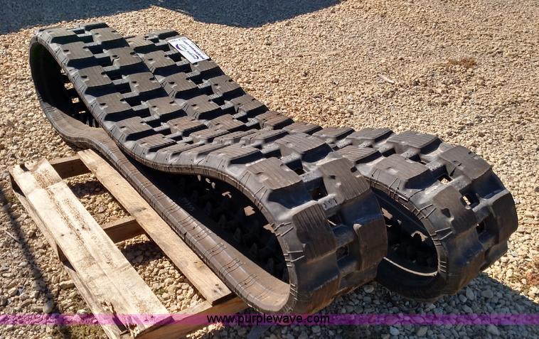 image for item K1223 John Deere 323E skid steer tracks