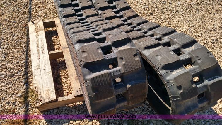 image for item K1223 John Deere 323E skid steer tracks