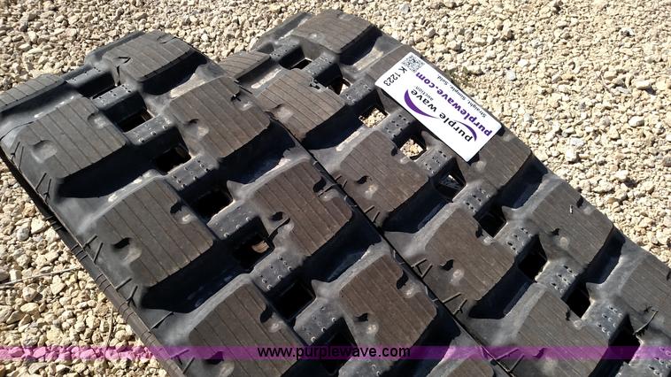 image for item K1223 John Deere 323E skid steer tracks