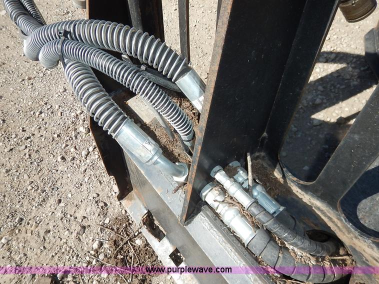 image for item K1745 Dymax high flow skid steer tree saw