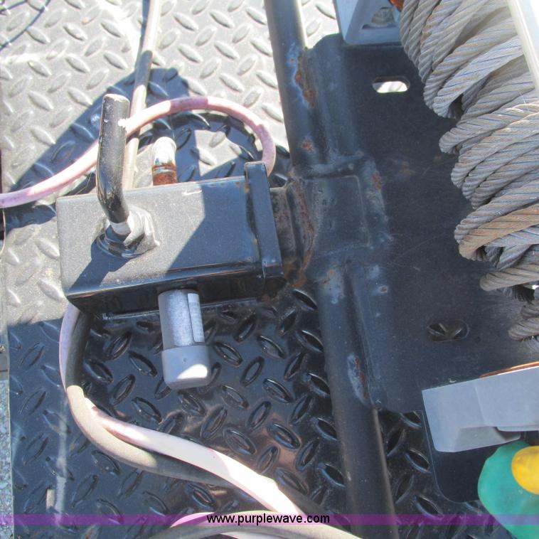 image for item L5302 2010 Kwik Load rollback trailer