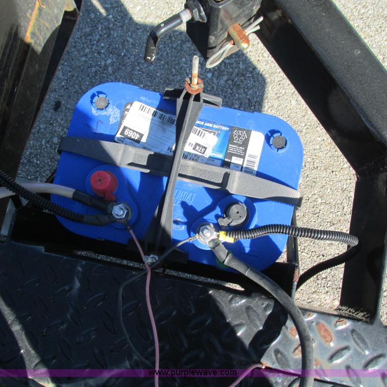 image for item L5302 2010 Kwik Load rollback trailer