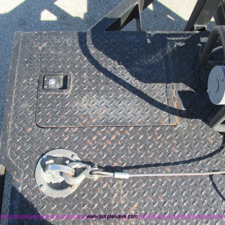 image for item L5302 2010 Kwik Load rollback trailer