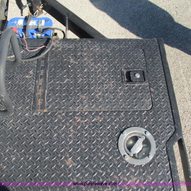 image for item L5302 2010 Kwik Load rollback trailer