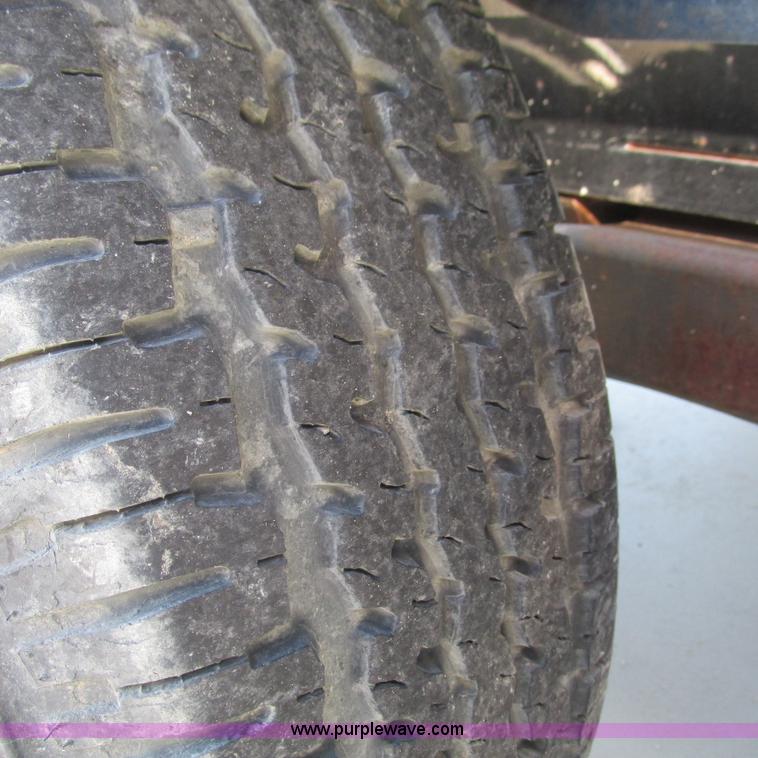 image for item L5302 2010 Kwik Load rollback trailer