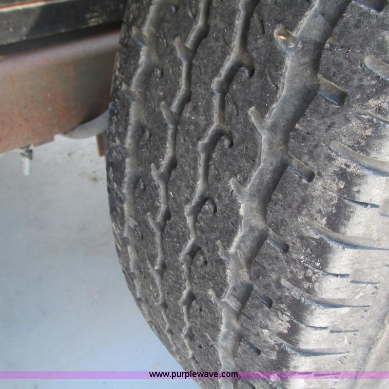 image for item L5302 2010 Kwik Load rollback trailer