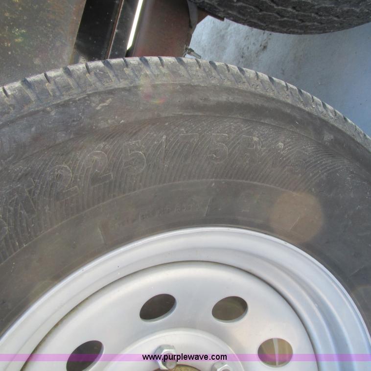 image for item L5302 2010 Kwik Load rollback trailer