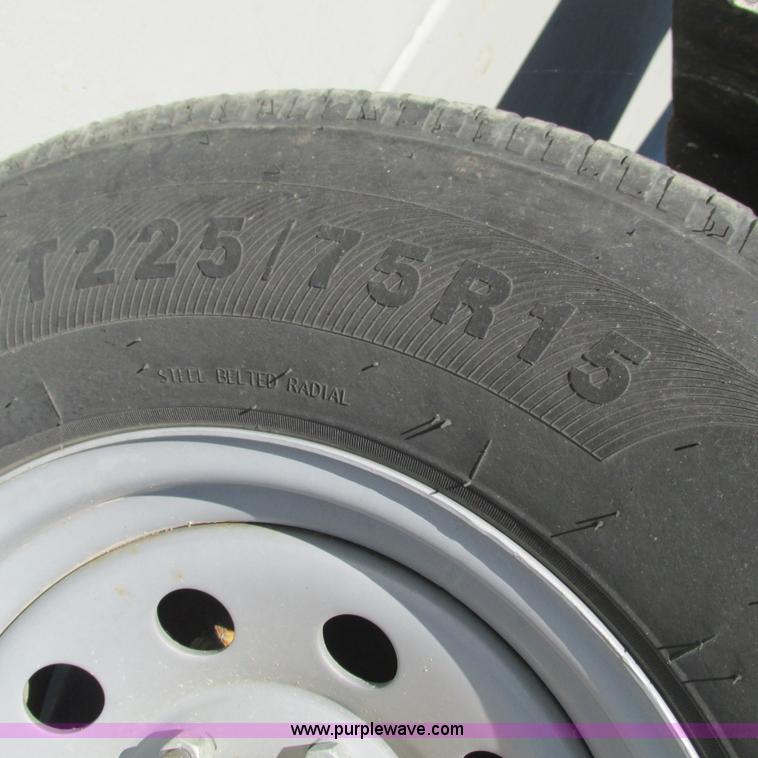 image for item L5302 2010 Kwik Load rollback trailer