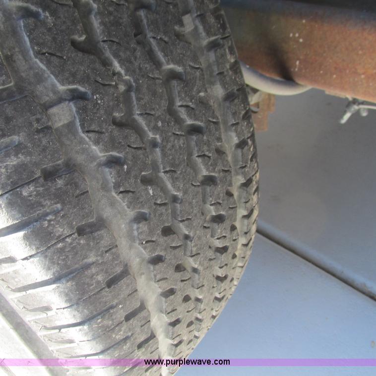 image for item L5302 2010 Kwik Load rollback trailer