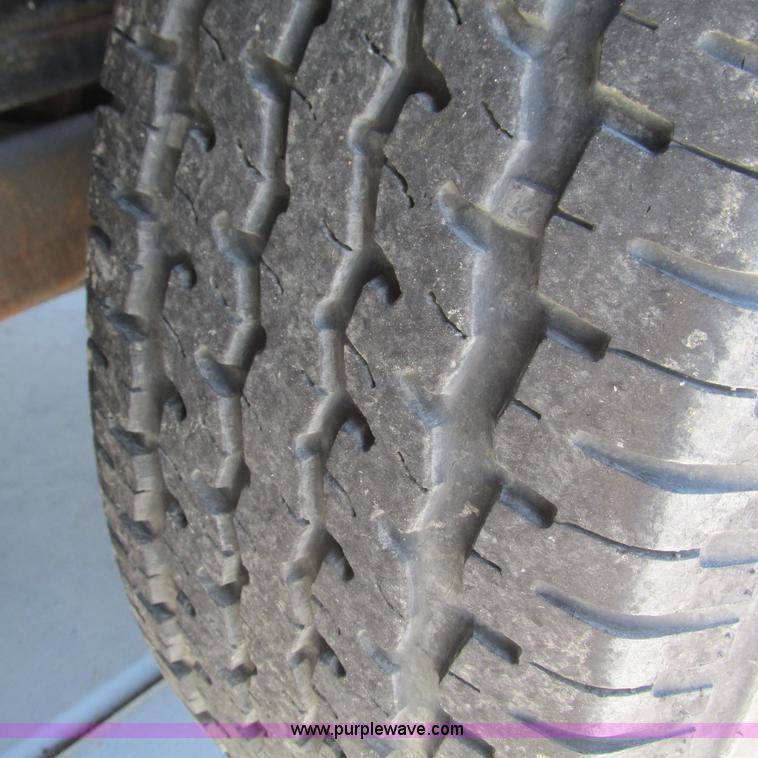 image for item L5302 2010 Kwik Load rollback trailer