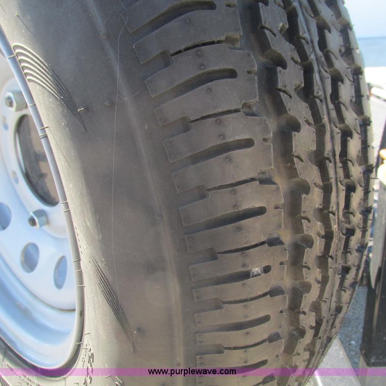 image for item L5302 2010 Kwik Load rollback trailer