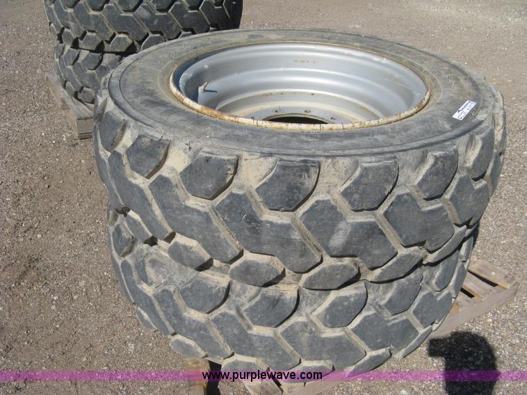 image for item BL9177 (4) Firestone DuraForce MH tires and wheels