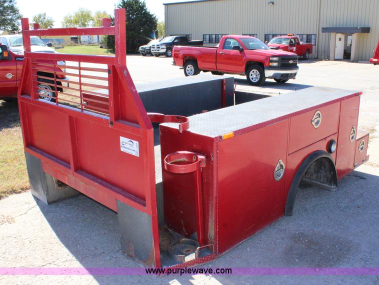 image for item L2464 2004 Caseco utility bed