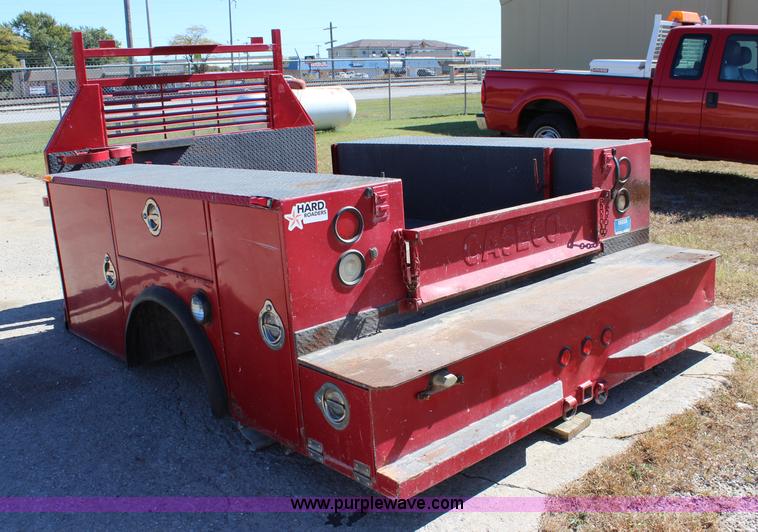 image for item L2464 2004 Caseco utility bed