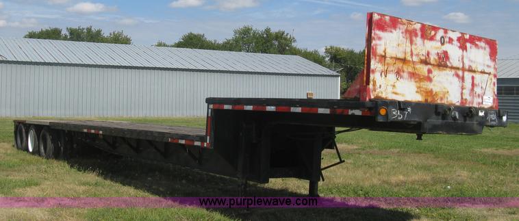 image for item L6411 1989 Fontaine DFT4-7048 drop deck trailer