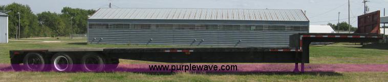 image for item L6411 1989 Fontaine DFT4-7048 drop deck trailer