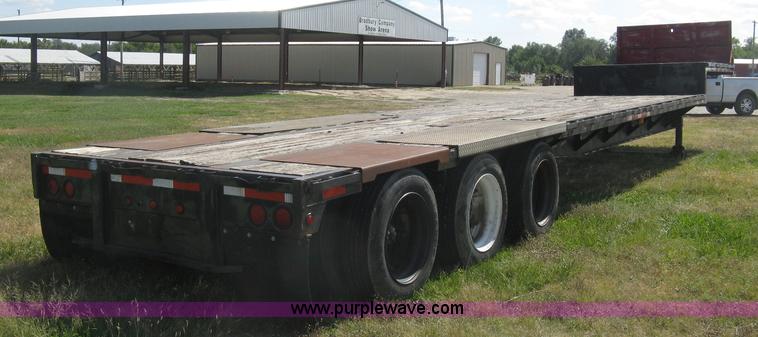 image for item L6411 1989 Fontaine DFT4-7048 drop deck trailer