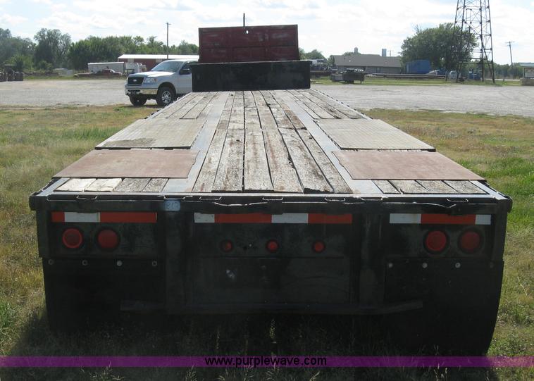 image for item L6411 1989 Fontaine DFT4-7048 drop deck trailer