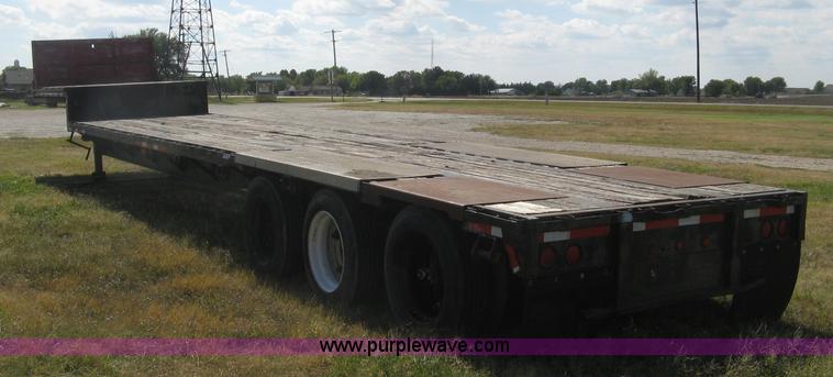 image for item L6411 1989 Fontaine DFT4-7048 drop deck trailer