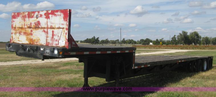 image for item L6411 1989 Fontaine DFT4-7048 drop deck trailer