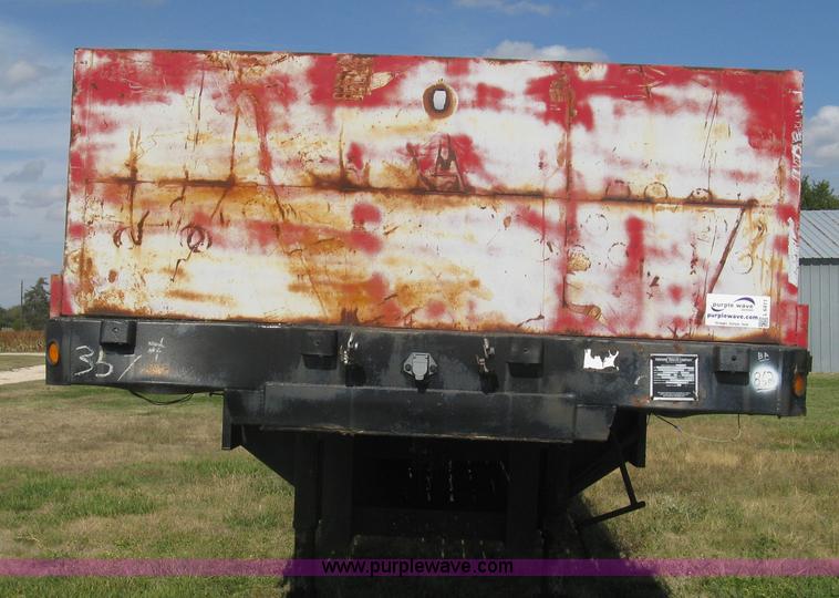 image for item L6411 1989 Fontaine DFT4-7048 drop deck trailer
