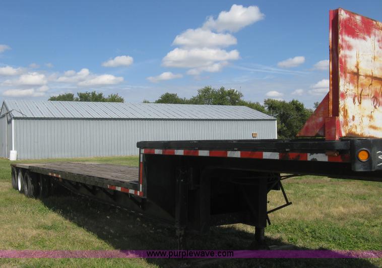 image for item L6411 1989 Fontaine DFT4-7048 drop deck trailer