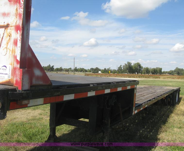 image for item L6411 1989 Fontaine DFT4-7048 drop deck trailer