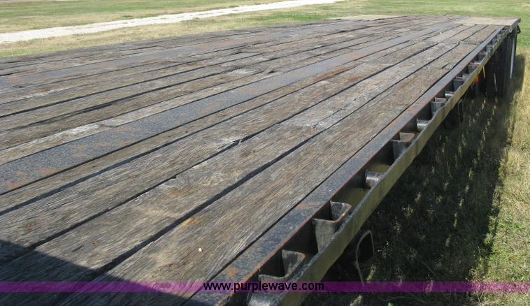 image for item L6411 1989 Fontaine DFT4-7048 drop deck trailer