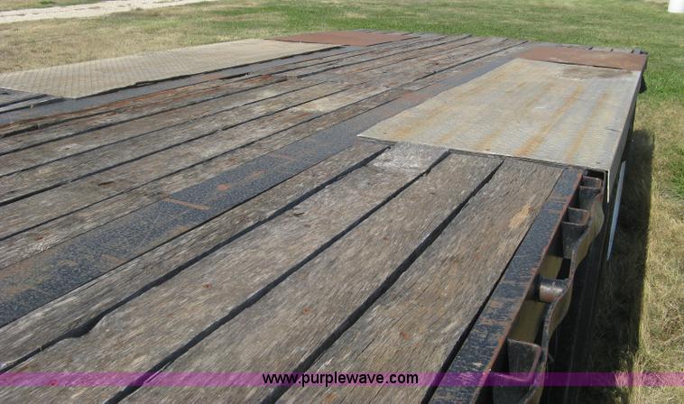 image for item L6411 1989 Fontaine DFT4-7048 drop deck trailer