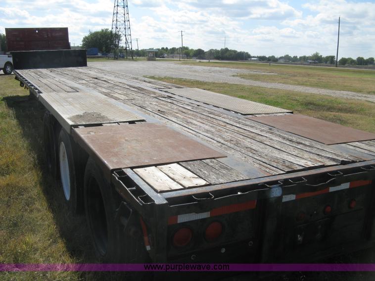 image for item L6411 1989 Fontaine DFT4-7048 drop deck trailer