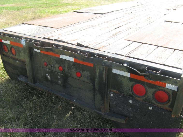 image for item L6411 1989 Fontaine DFT4-7048 drop deck trailer