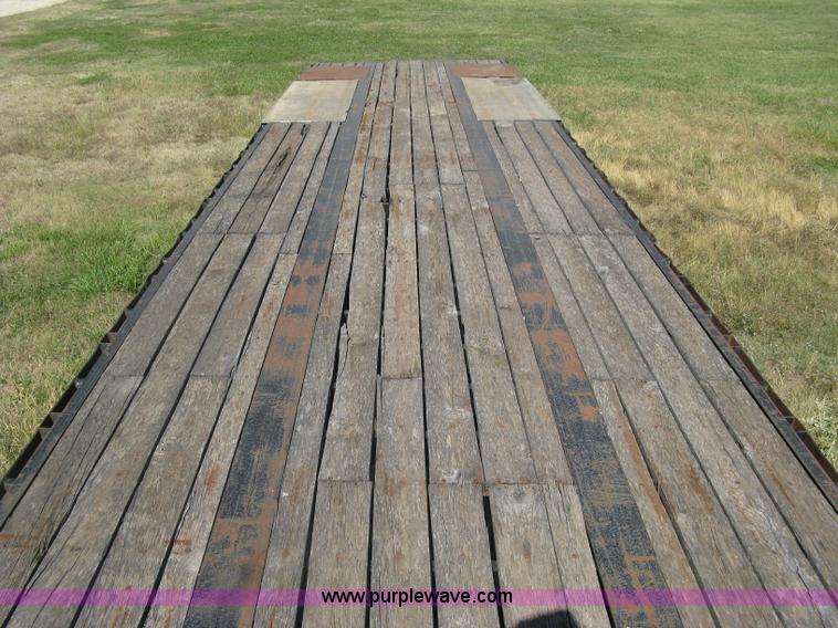 image for item L6411 1989 Fontaine DFT4-7048 drop deck trailer