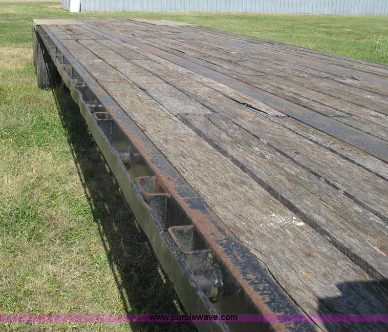 image for item L6411 1989 Fontaine DFT4-7048 drop deck trailer