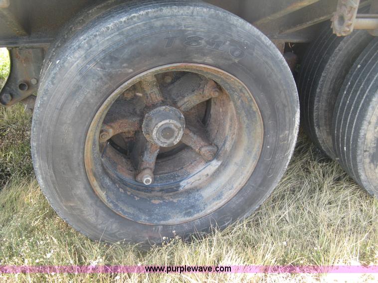 image for item L6411 1989 Fontaine DFT4-7048 drop deck trailer